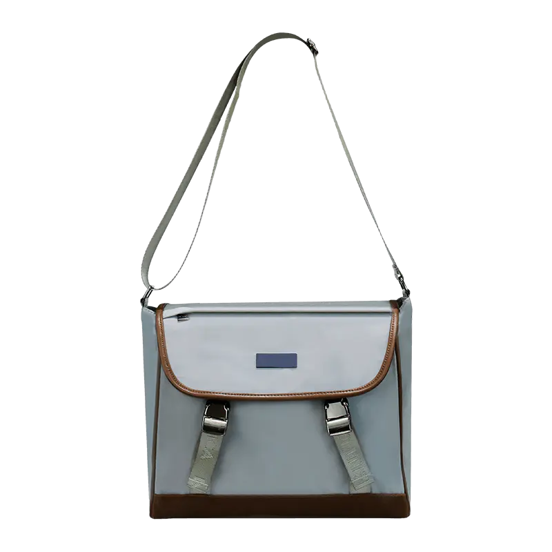Crossbody-laukut matkoille: koko, olkaimet ja kangasvalinnat